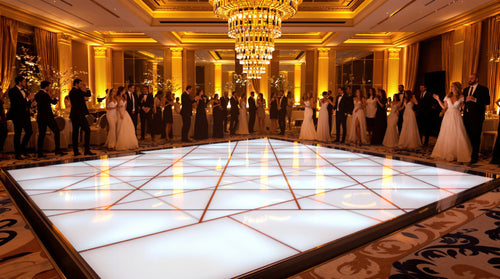12x12 LED dance floor, 6x6 tile grid of 2ft panels, glowing gold and white in a luxury ballroom