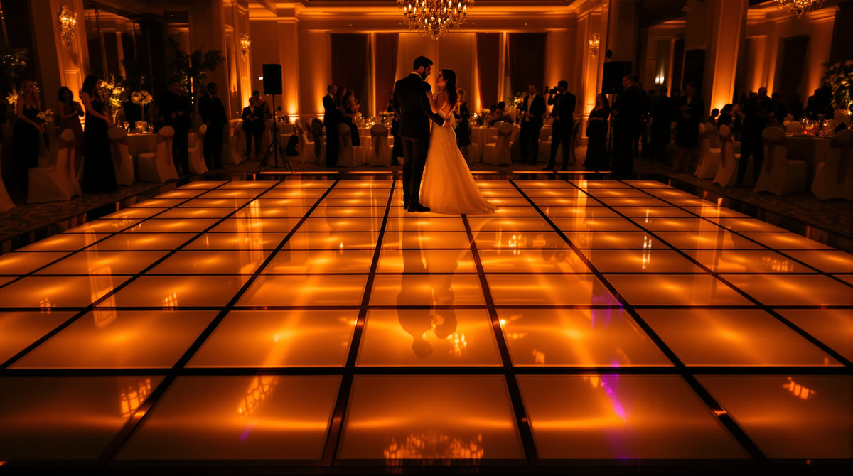 10x10 LED dance floor, 5x5 tile grid of 2ft panels, glowing gold and white in an indoor banquet hall